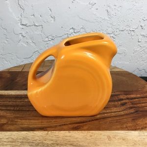 Fiesta ware Tangerine mini disc pitcher in like new condition.